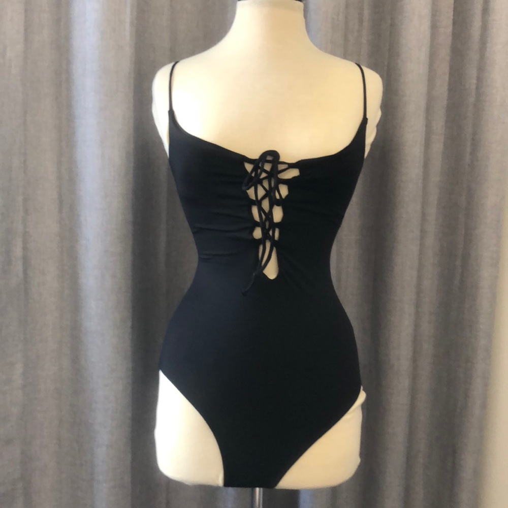 New with tags corset type one piece by Quint Soul